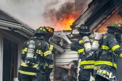 Firefighters douse flames  during a house fire in Barrington Hills IL. Larry Shapiro photo