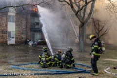 Firefighters direct a stream towards the third floor. Larry Shapiro photo