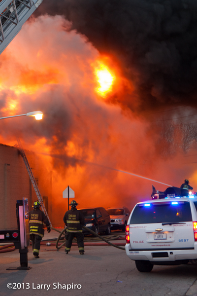massive 4-11 alarm fire destroys stores on Chicago's north side