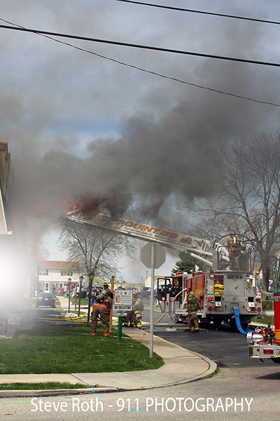 firemen battle Townhouse fire in Hanover PA