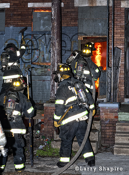 Camden firemen battle 2-alarm fire at night in vacant row house