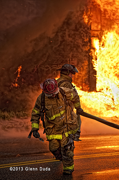 Detroit firemen battle a commercial fire