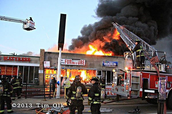 massive 4-11 alarm fire destroys stores on Chicago's north side 