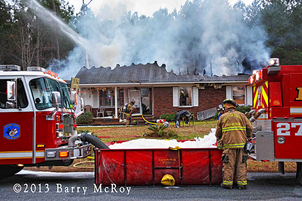 Colleton County Fire Rescue personnel battle rural house fire