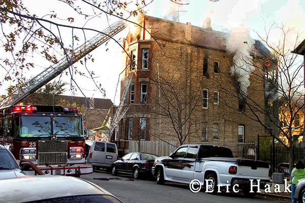 Chicago firemen battle fatal apartment fire
