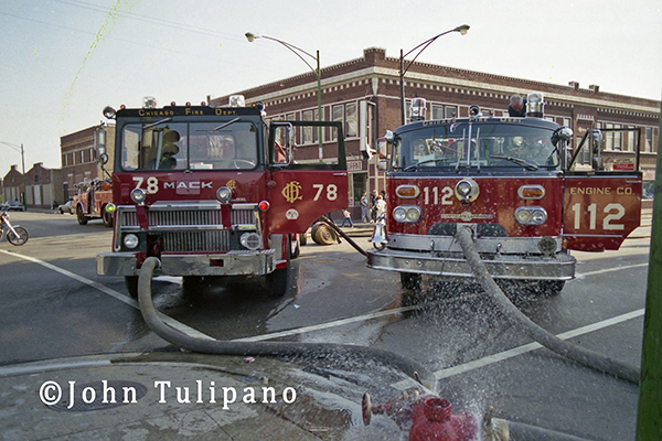 old Chicago fire engines at fire scene