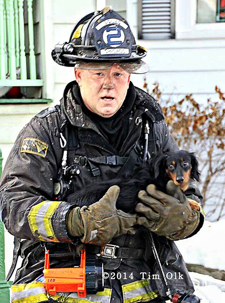 Chicago firefighter rescues dog from house fire