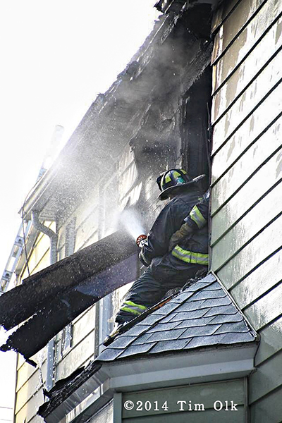Chicago firemen fight winter house fire