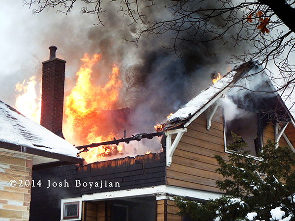 Chicago firemen fight winter house fire 