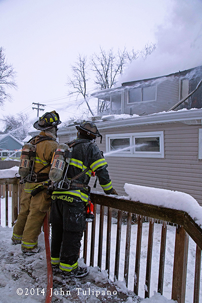 St Charles firefighters battle house fire in frigid weather