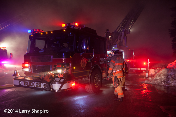 fire truck in smoke at night fire scene