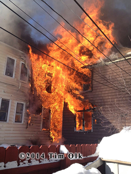 heavy flames engulf rear or building
