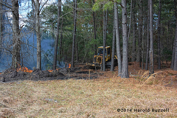 tractor works at forestry fire