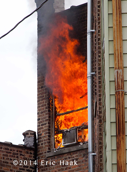 apartment fire in Chicago with heavy flames