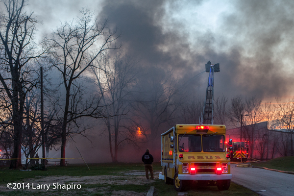 firemen at Indianapolis fire scene with lots of smoke