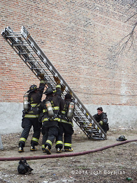 fireman raise a banger ladder