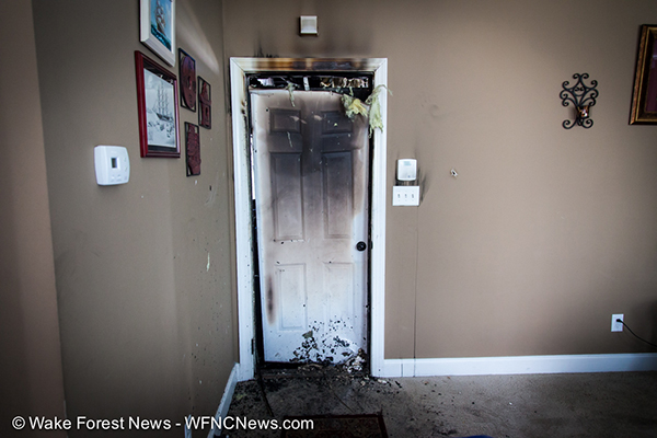 interior door withholds fire between garage and house