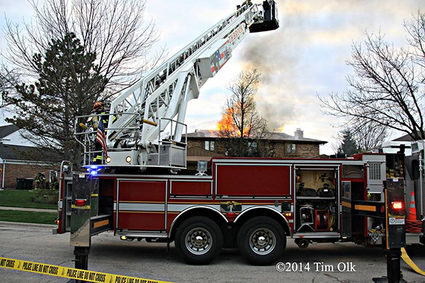 Pierce fire truck at house fire scene