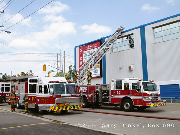 Pierce and KME fire trucks at Canada fire scene