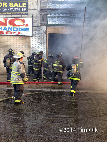 firefighters at warehouse fire in Chicago