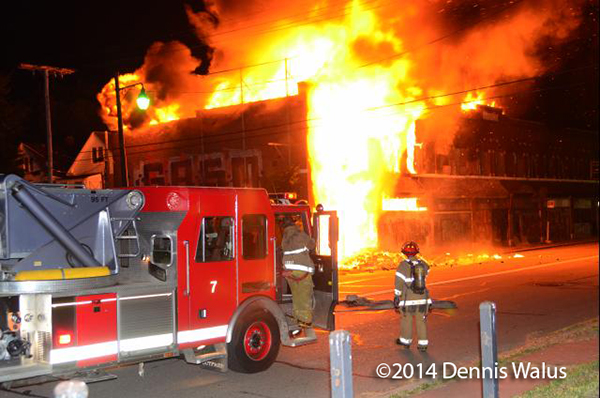 vacant commercial building in Detroit fully involved in fire