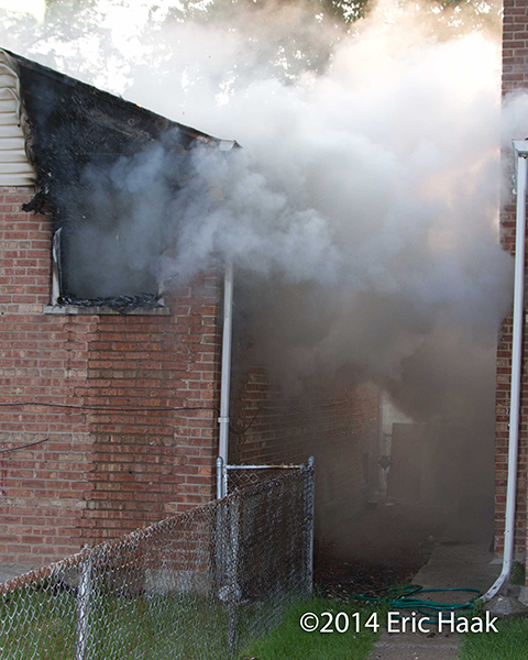 smoke conversion as water hits a house fire