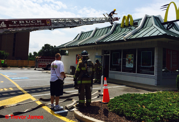 firemen after fire in a McDonalds