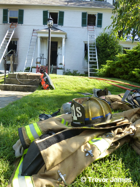 fire scene with firefighter's helmet