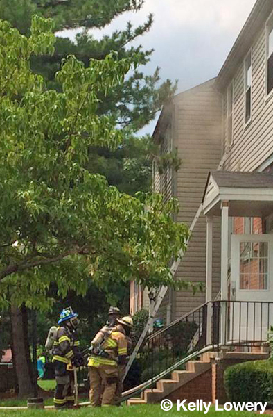 firefighters working at a building fire in MD