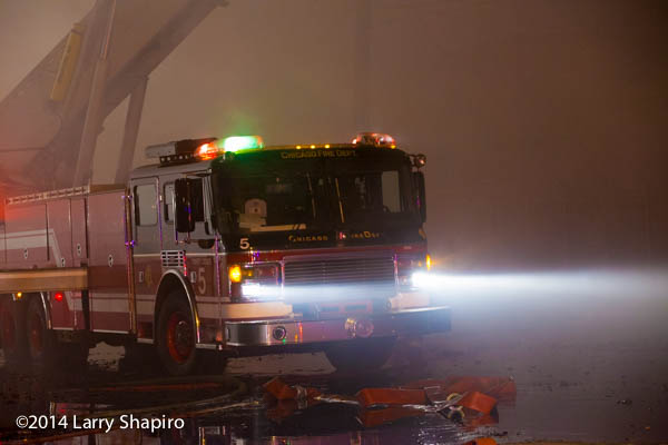 Chicago FD tower ladder at night fire scene American LaFrance