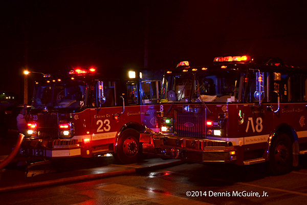 Chicago fire engines at night fire scene