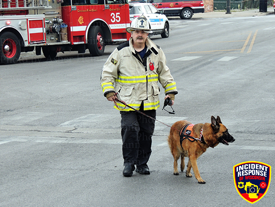 Chicago FD Chaplain with German shepard