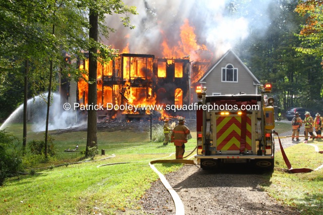 house fully engulfed with fire