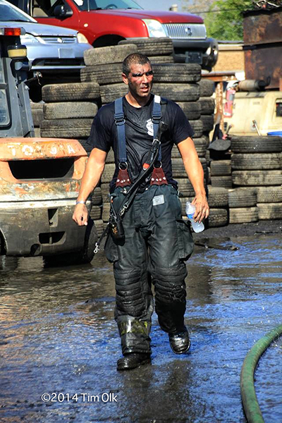 fireman after battling a fire on a very hot day