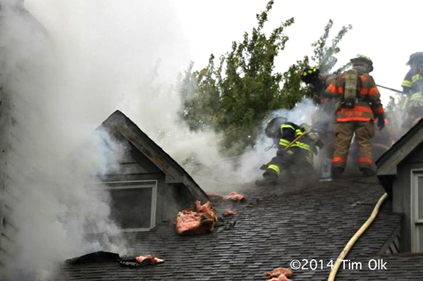 smoke from the roof of a house fire