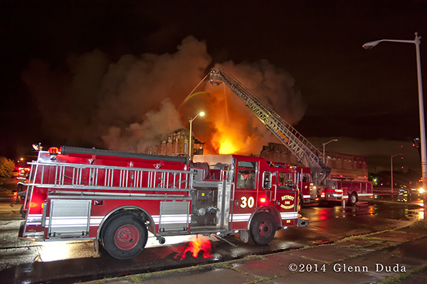 Detroit fire engines at huge night fire scene
