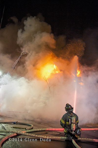 firemen with multi-versal at night fire scene
