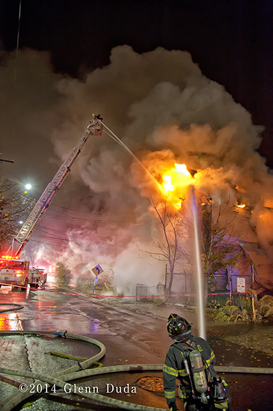 night fire scene with Sutphen aerial tower