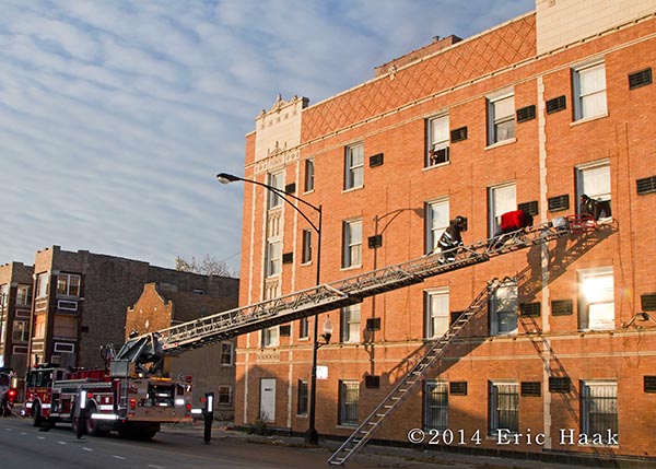 fireman rescues residents from apartment building via ladder