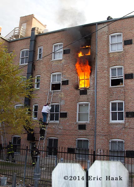 fireman rescues residents from apartment building via ladder