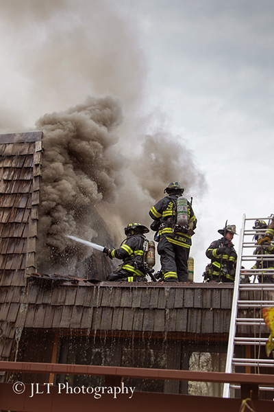house fire with mansard roof