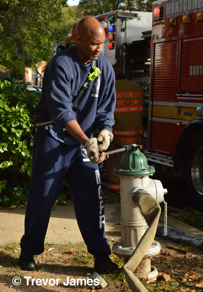firefighter with fire hydrant