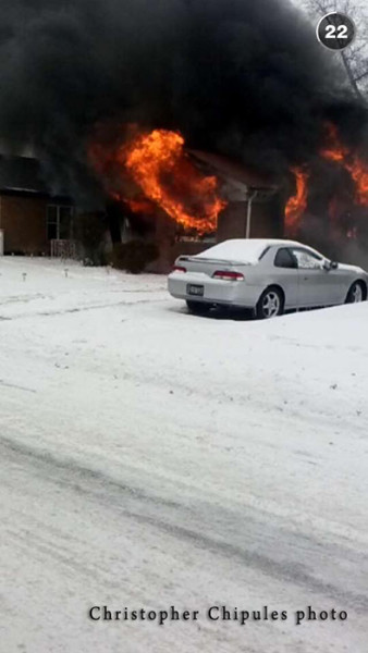 garage fully engulfed in flames