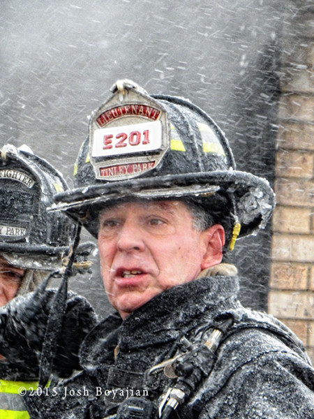 fireman with ice covered helmet
