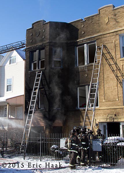 apartment building charred  after fire