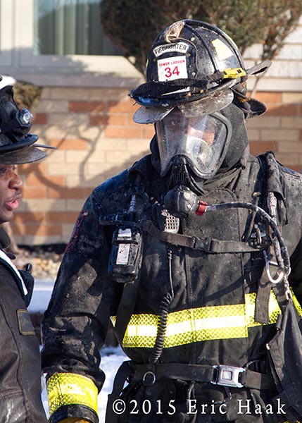 fireman with helmet and air mask