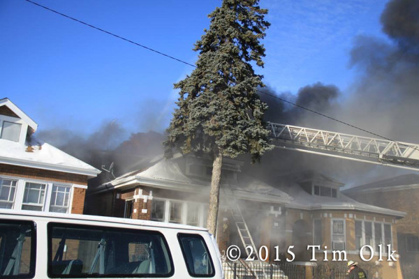 house on fire with smoke