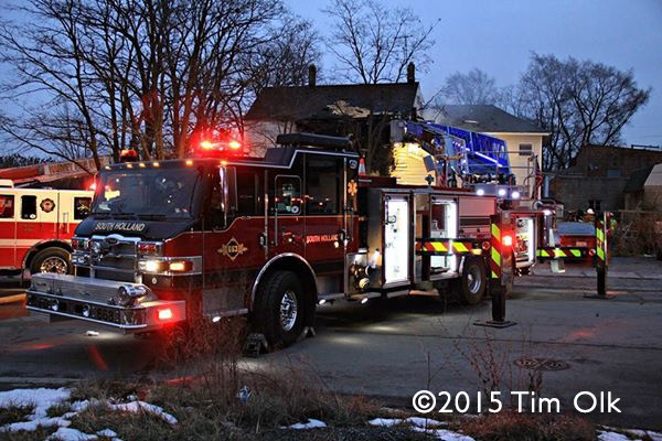 fire truck at house fire scene