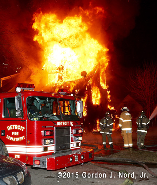 Detroit firemen at night house fire