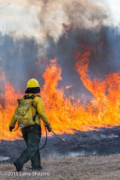 wildland firefighter at prairie burn